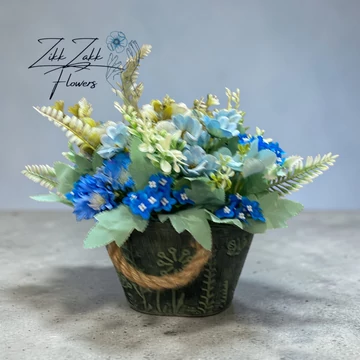 Kék virág kompozíció rusztikus kaspóban