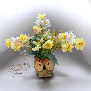 Sárga virág kompozíció bagoly kaspóban